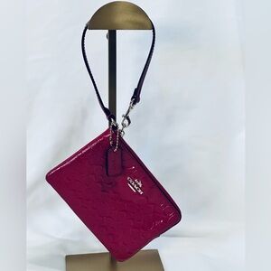 Coach Corner Zip Wristlet in Cranberry